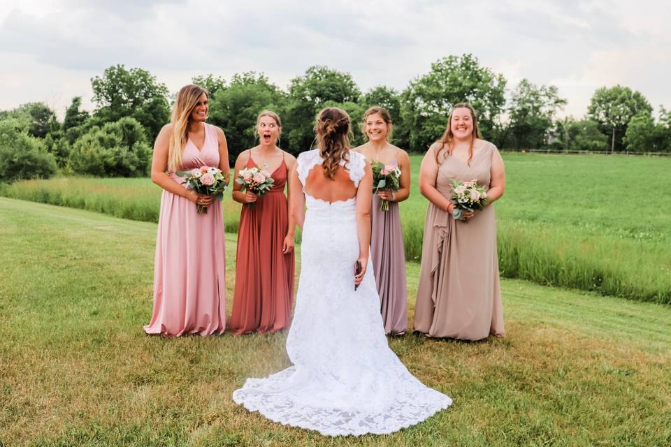 Bridesmaids photo op, field.