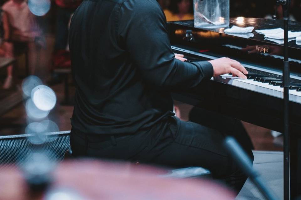 Chase on the piano