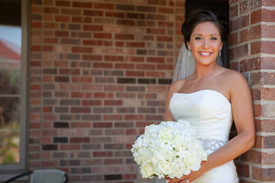 Bride outside her home