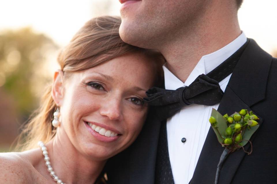 Bride on groom's chest