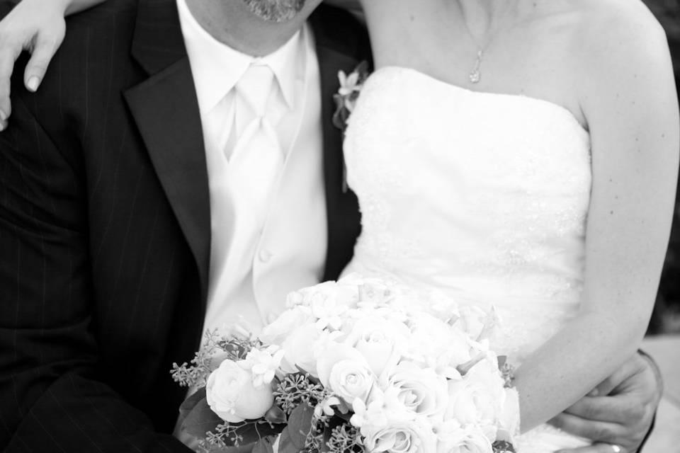 Bride on groom's lap