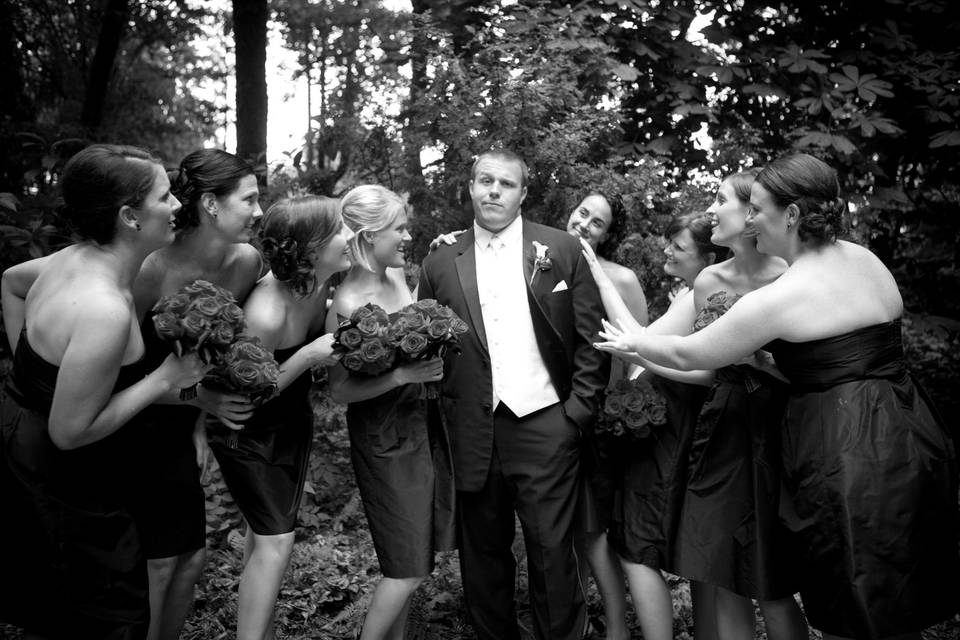 Bridesmaids with groom