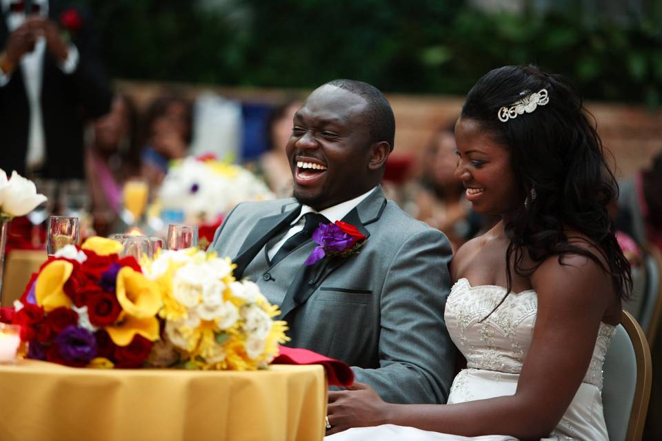 Laughing groom at reception