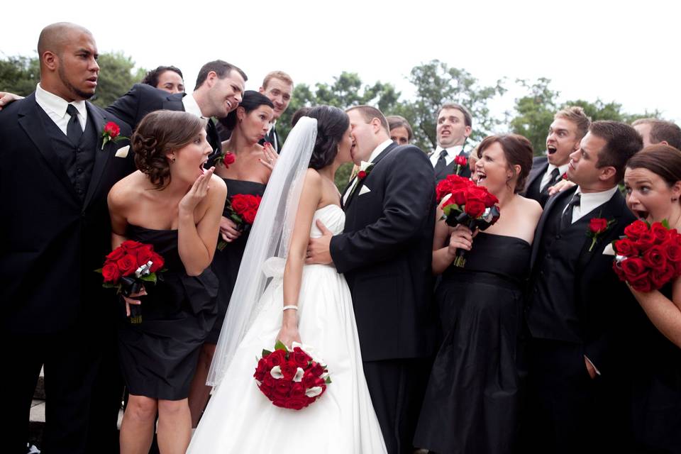 Bridal party kiss