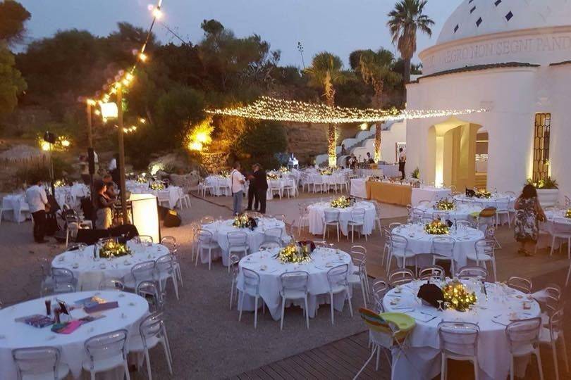 Destination Wedding light and table set up at Kallithea Springs Rhodes Greece