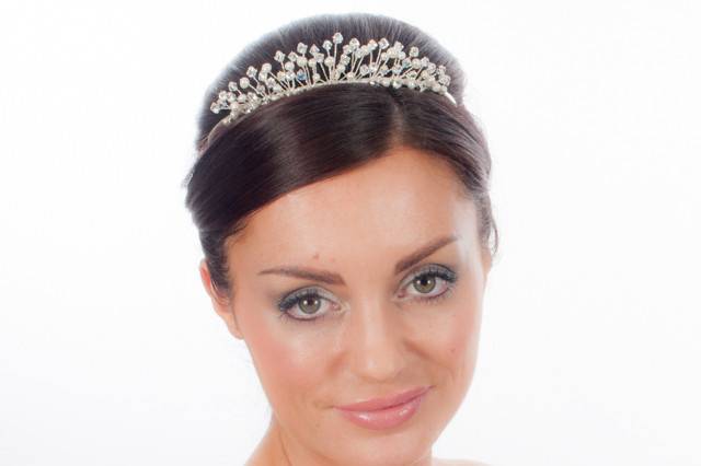 This wedding tiara is stunning with AB Swarovski crystals, diamantes and freshwater pearls. Approx height: 3cm length: 17cm