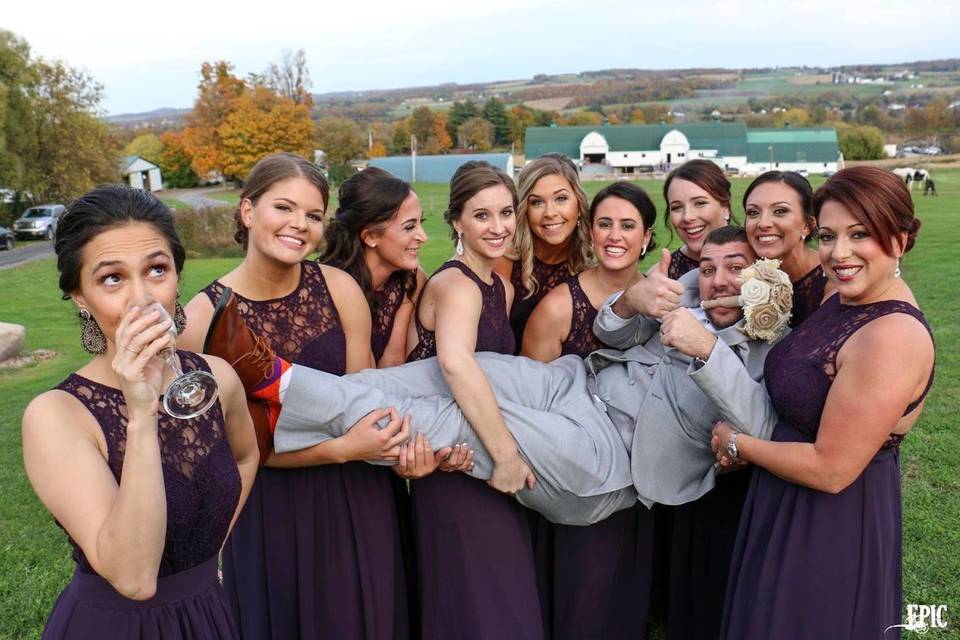 The groom with the bridesmaids