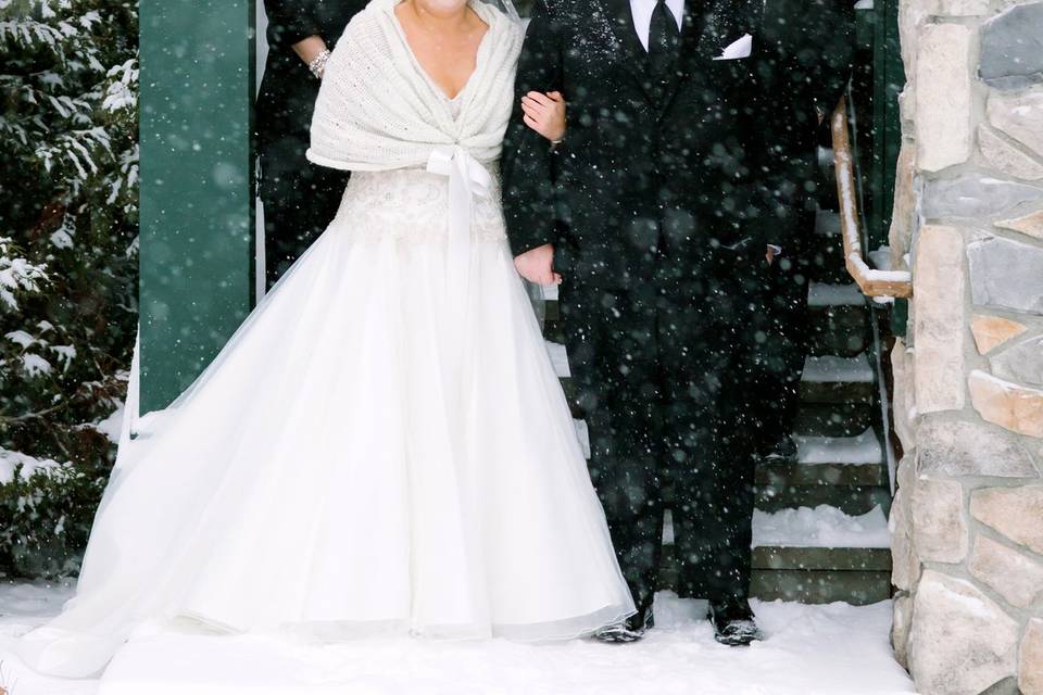 Newlyweds and their guests in the snow