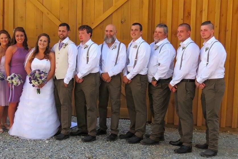 The couple with the bridesmaids and groomsmen