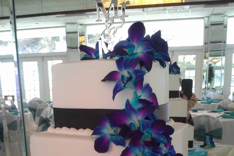 Square design with electric blue orchids cascading