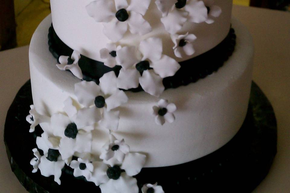 White and black floral wedding cake