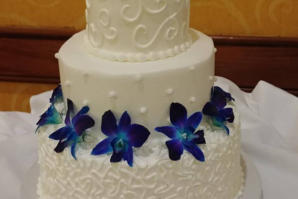 Lovely Wedding Cake with Electric Blue fresh Orchids
