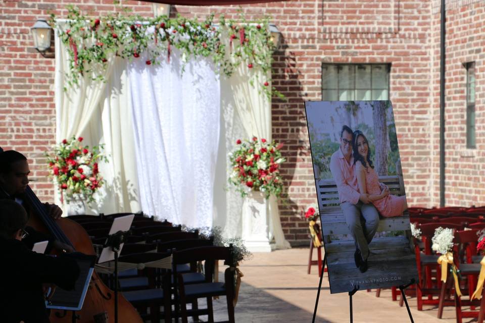 Ceremony Backdrop in Rustic Courtyard