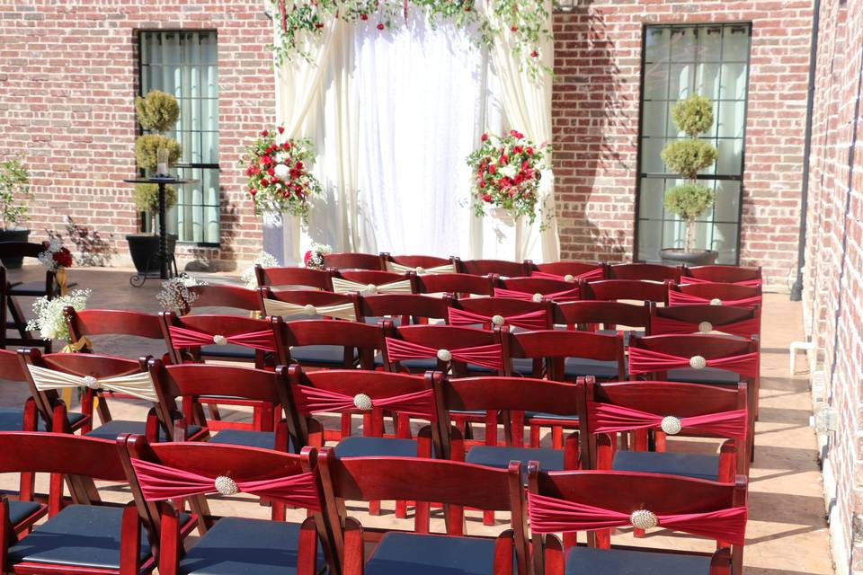 Ceremony Backdrop in a courtyard