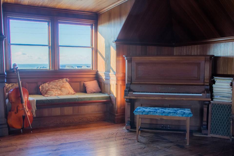 virgin redwood ballroom with window seat, view of Pacific ocean (with piano and cello)