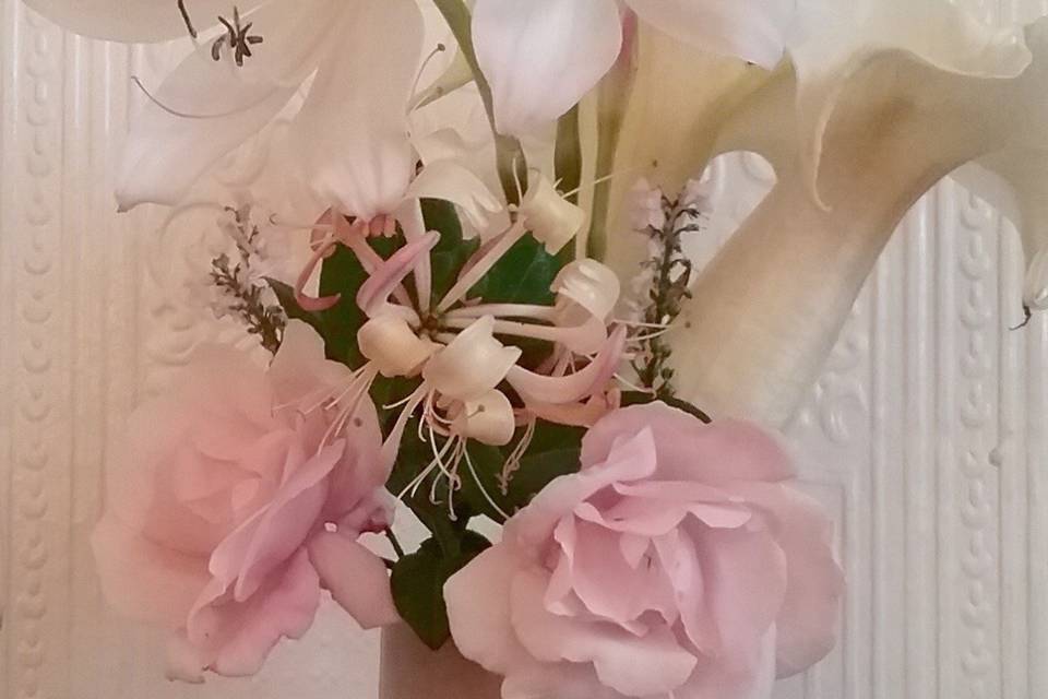 Crinum lily, Belgian honeysuckle, and pink roses from Weller House gardens