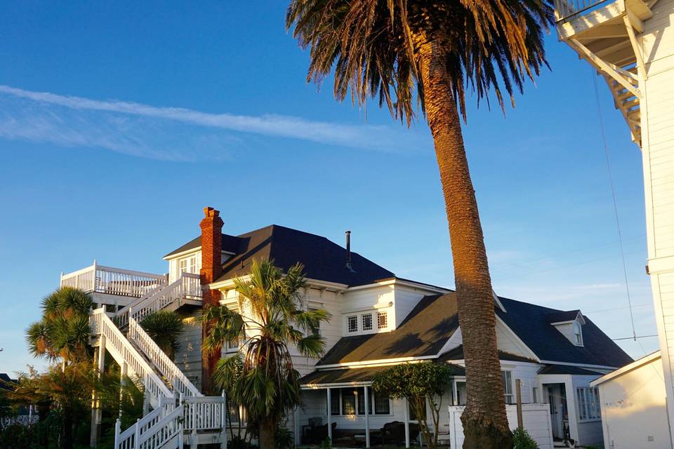 Weller House and water tower and exterior stairs to ballroom balcony, east lawn (can accommodate tent for 150 dining)