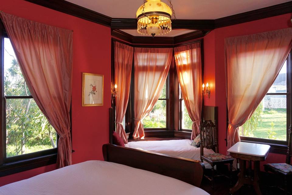 Weller House, Rose room with 1 king, 1 twin bed (6 windows facing east and south)