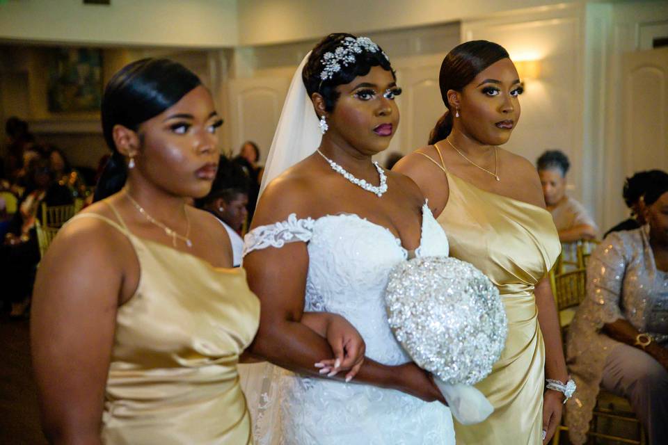 Daughters escorting mother.