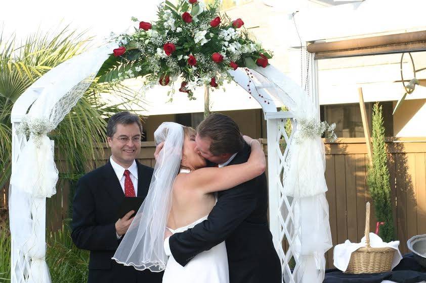 Newlyweds kissing