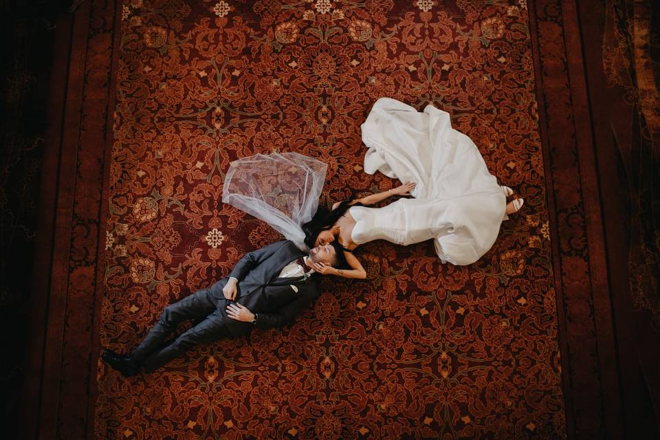 Bride and groom on carpet