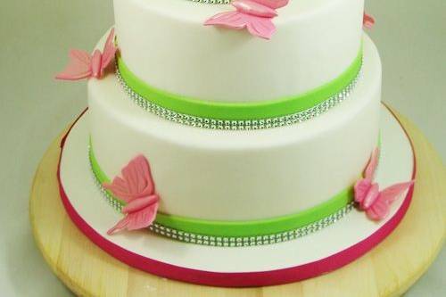 Wedding cake with green ribbon
