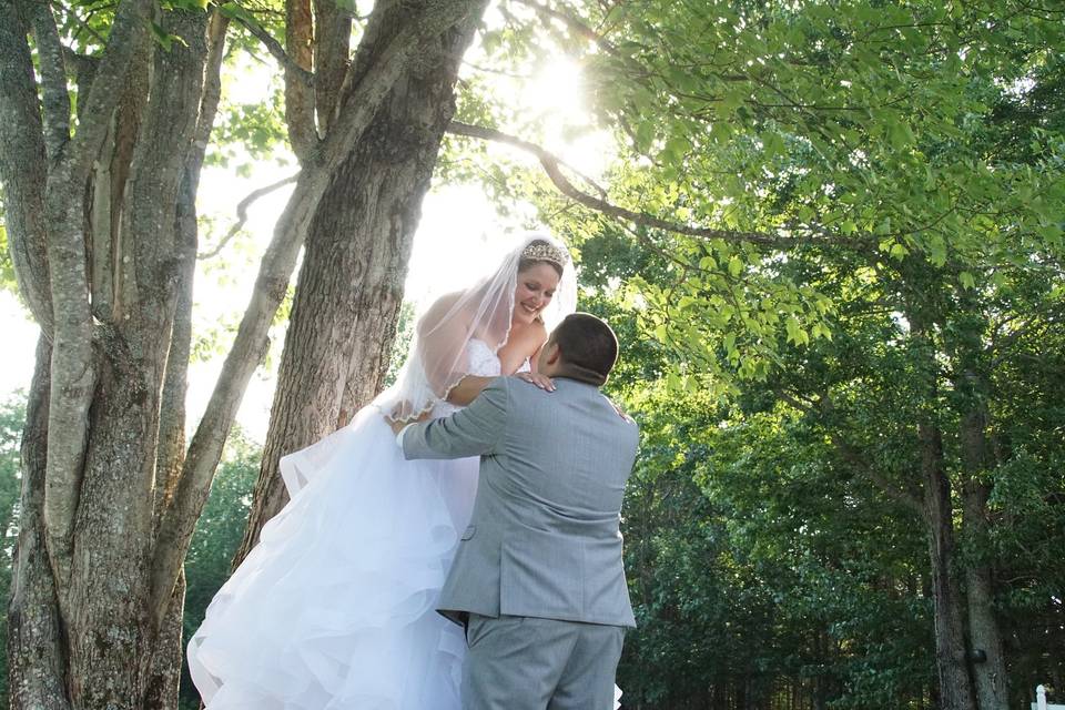 Bride by the trees