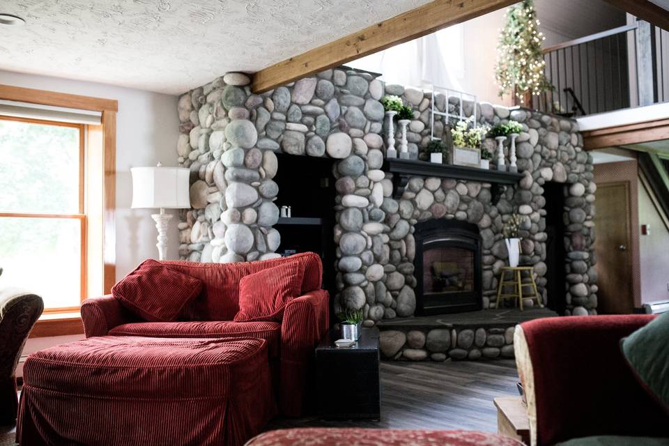Stone fireplace in farmhouse | @JennaBorstPhotography