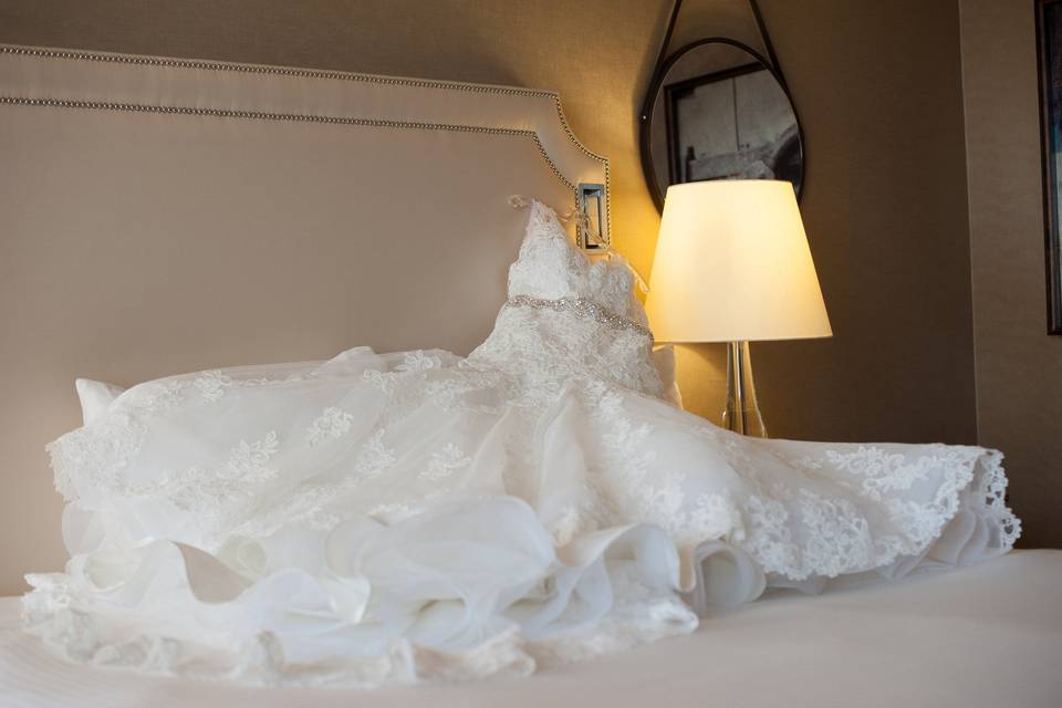 Wedding dress on bed