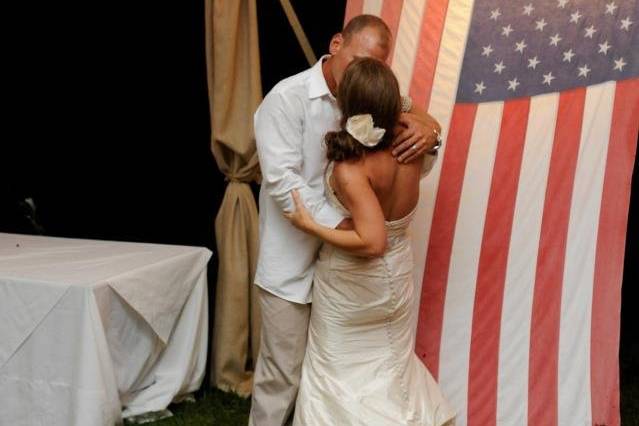 Couple holding hands and kissing