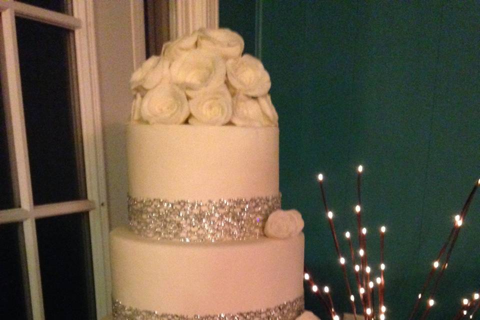 White wedding cake with a touch of silver