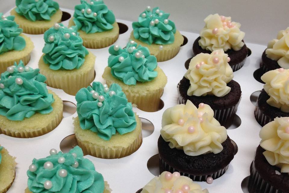 Teal and white cupcakes