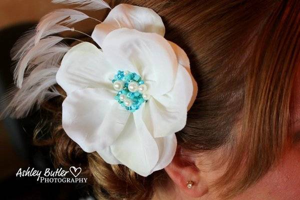 Ivory flower with aqua beading and feathers