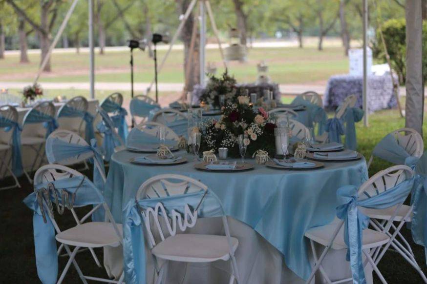 Floral centerpieces for outdoor wedding venue.