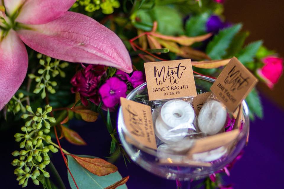 Wedding favors and floral arrangement