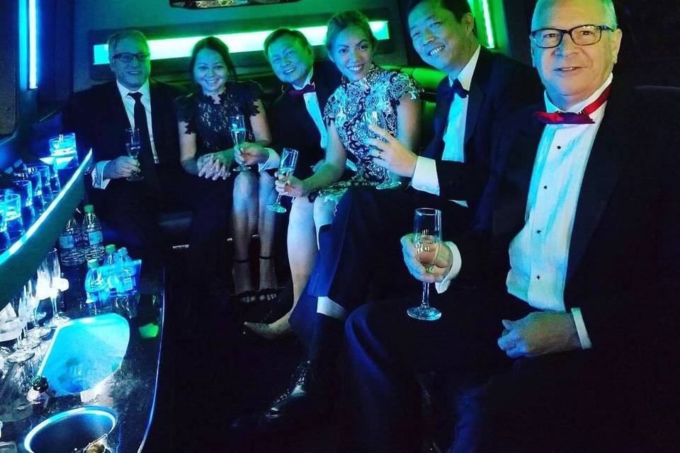 Guests enjoying the Limo Bus
