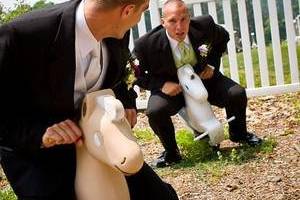 Groom and groomsman playing