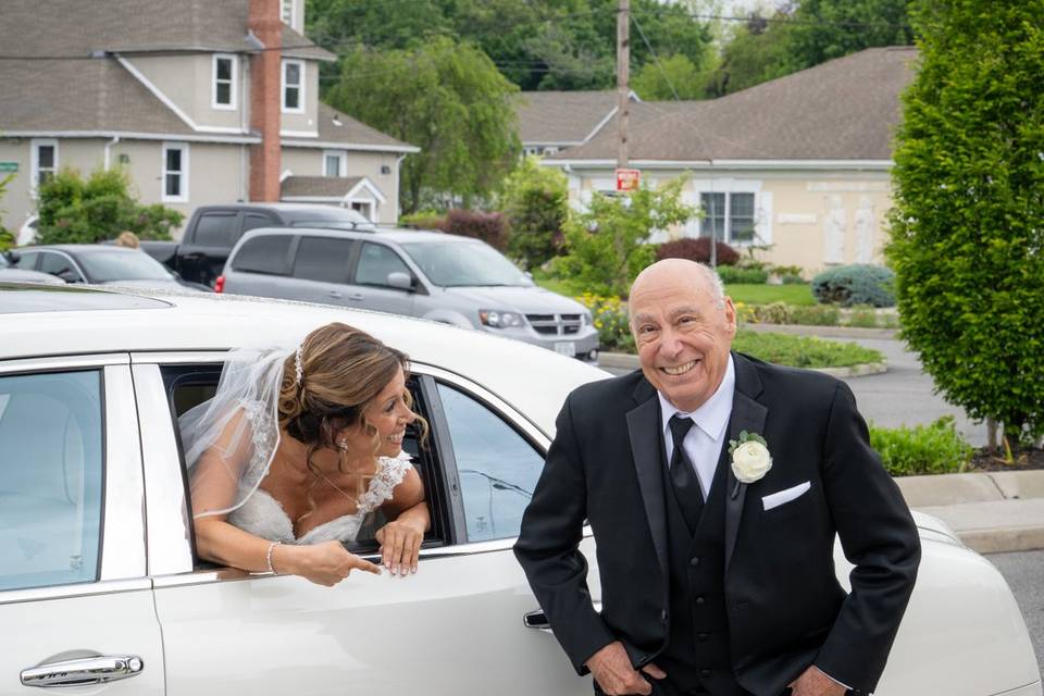 A father’s proud smile.