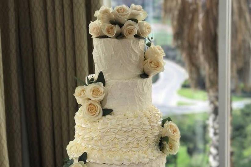 Intricately frosted wedding cake