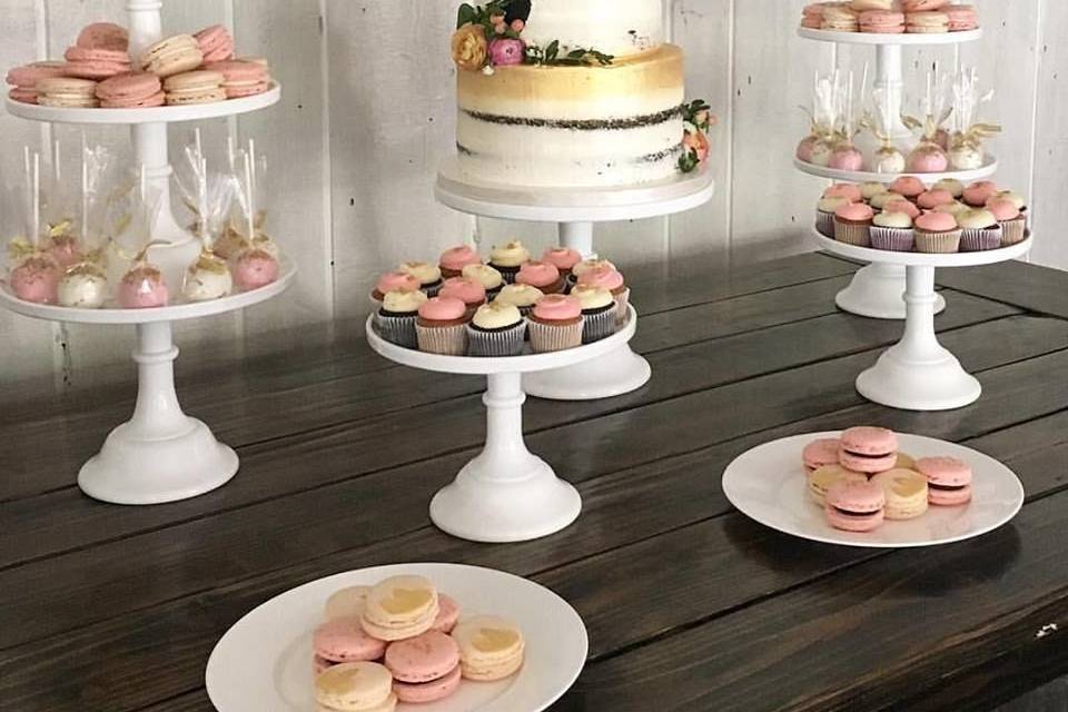Wedding cake, cupcakes, and macarons