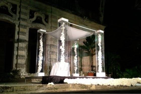 Acrylic Plexiglass structure by Arc Divine Miami at Vizcaya FL $649.00, florals and delivery extra.  Arc Divine, exquisitely beautiful wedding Alters, Arches, Arcs, Canopies, Chuppahs and Mandaps, from the Ultra Modern to the classic and traditional.   www.ArcDivine.com 954.319.6126www.MiamiWeddingArches.comn to the classic and traditional.   www.ArcDivine.com 954.319.6126www.MiamiWeddingArches.com
