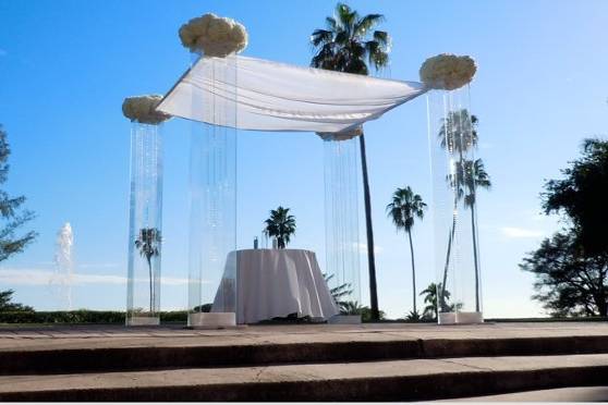 Acrylic Plexiglass structure by Arc Divine Miami at the Biltmore Coral Gables FL $649.00, florals and delivery extra.  Arc Divine, exquisitely beautiful wedding Alters, Arches, Arcs, Canopies, Chuppahs and Mandaps, from the Ultra Modern to the classic and traditional.   www.ArcDivine.com 954.319.6126www.MiamiWeddingArches.com