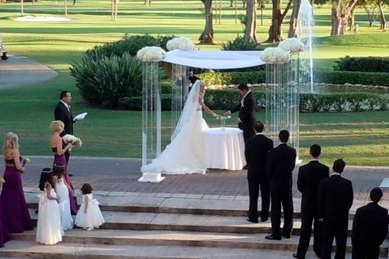 Acrylic Plexiglass structure by Arc Divine Miami at the Biltmore Coral Gables FL.  Arc Divine, exquisitely beautiful wedding Alters, Arches, Arcs, Canopies, Chuppahs and Mandaps, from the Ultra Modern to the classic and traditional.   www.ArcDivine.com 954.319.6126www.MiamiWeddingArches.com