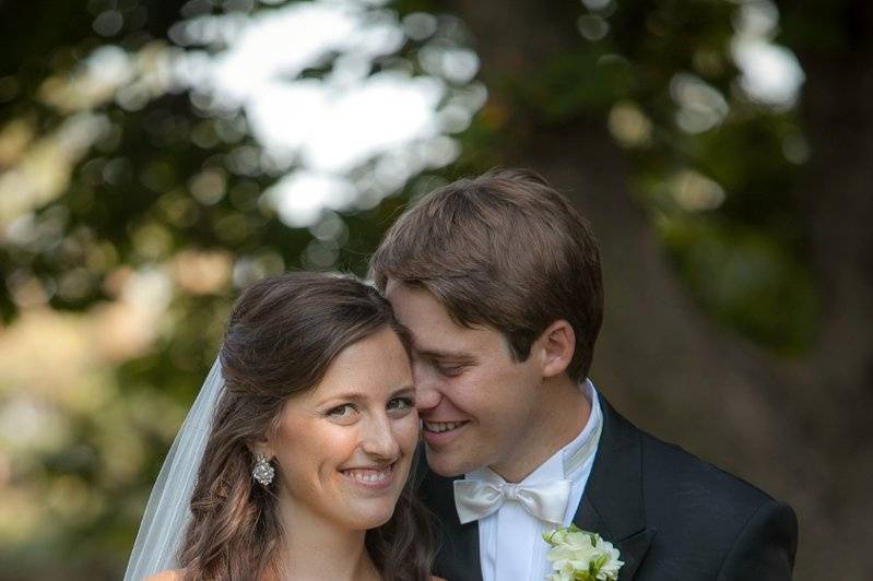 The Jesuit Gardens at Creighton University was an optimum location and full aesthetic look equipped with old shade trees, green space, and so close to St. John's Catholic Church. I really enjoyed how the couple and families worked so well with the flow of the day. Reception at the Holland Performing Arts Center.