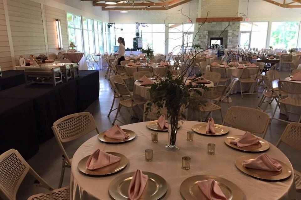 The village lodge provides seating for up to 300 people at tables and chairs, and includes a combination of both round tables (seating up to 8) and rectangular banquet tables for serving or head tables