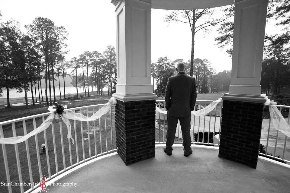 Groom having a moment to himself prior to the wedding ceremony. Photo by www.stanchambersjr.com.