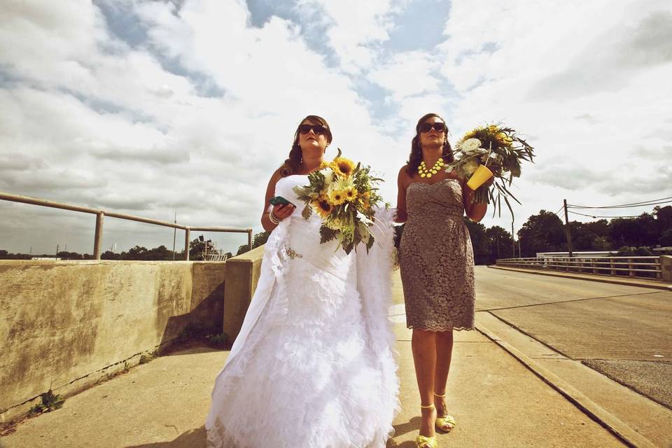 Bride & maid of honor walking off the Boylan Street Bridge in Raleigh, N.C. by www.stanchambersjr.com