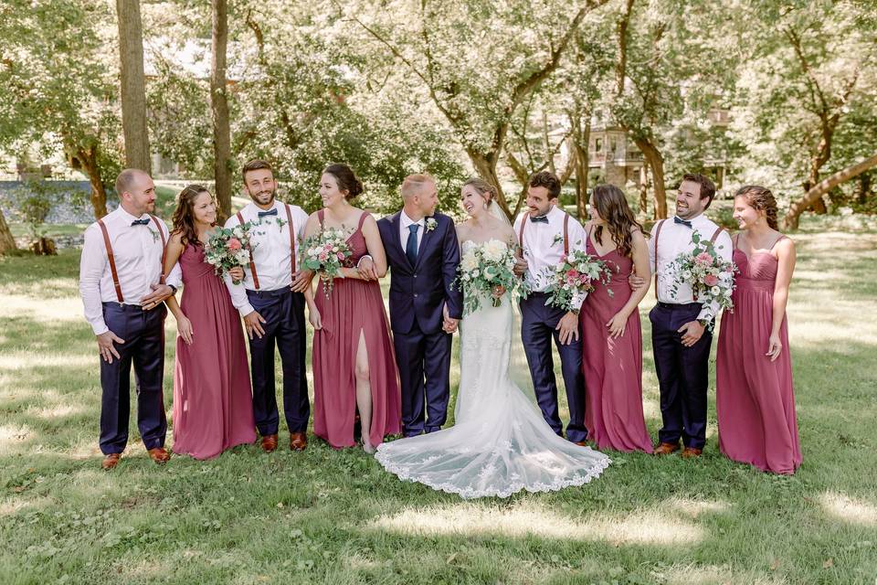 Bridal party laughing together