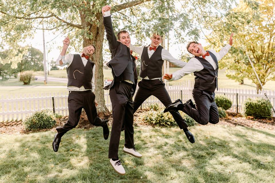 Groomsmen jumping together