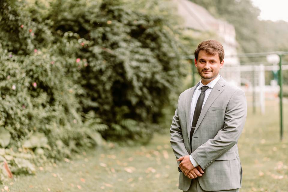 Groom waiting outside on bride